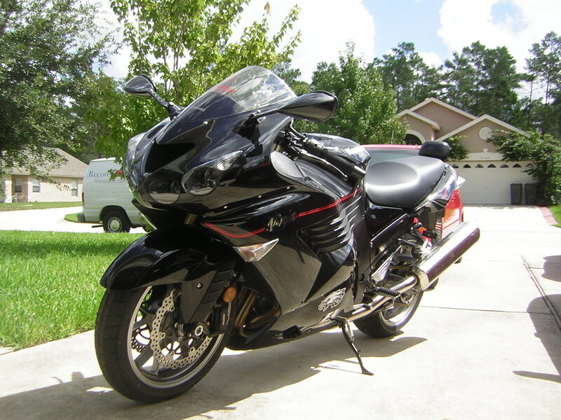 Black Sport Motorcycle — Calm, Afternoon, Photograph, Van