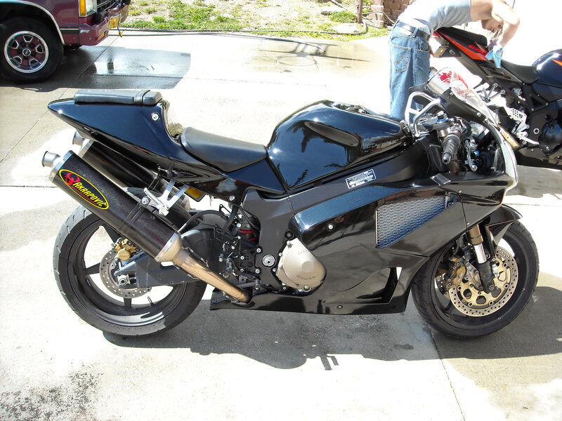 black sport motorcycle on driveway