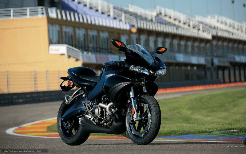 black sport motorcycle on racetrack
