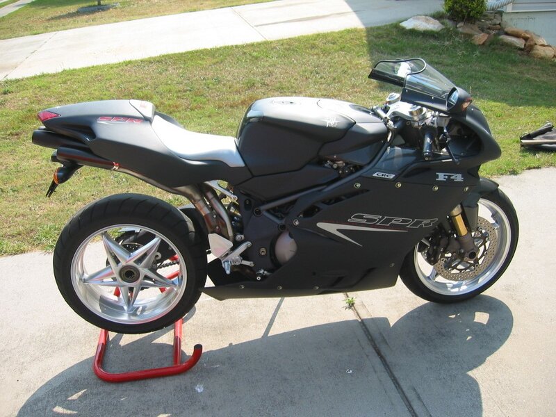 black sport motorcycle on stand