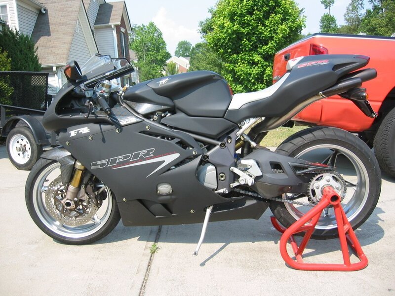 black sport motorcycle on stand