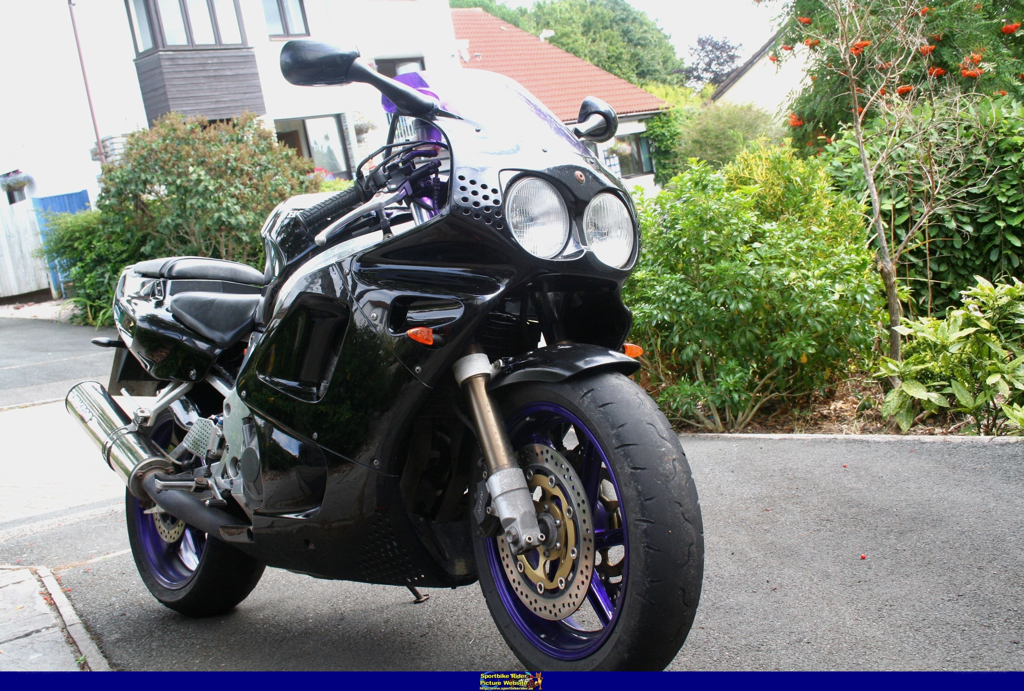 black sport motorcycle parked