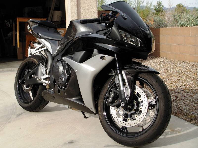 black sport motorcycle parked outside