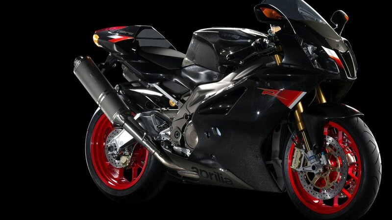 black sport motorcycle with red wheels