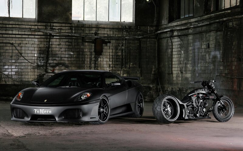 Black sports car and motorcycle