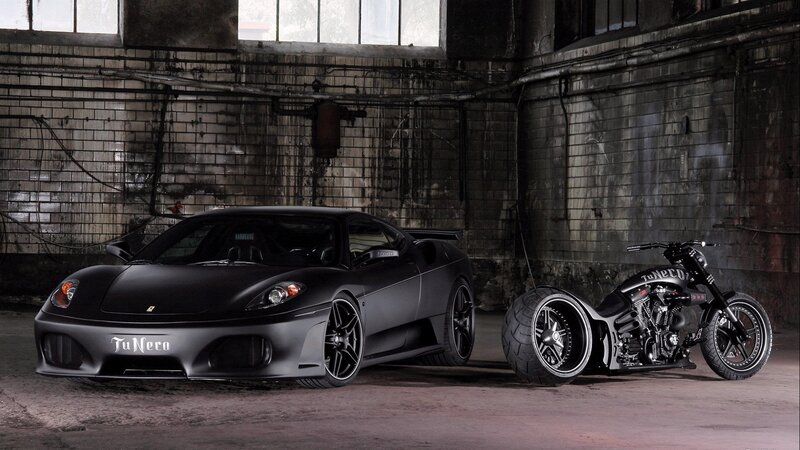 Black sports car and motorcycle