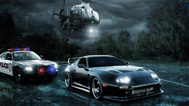Black Sports Car and Police Car