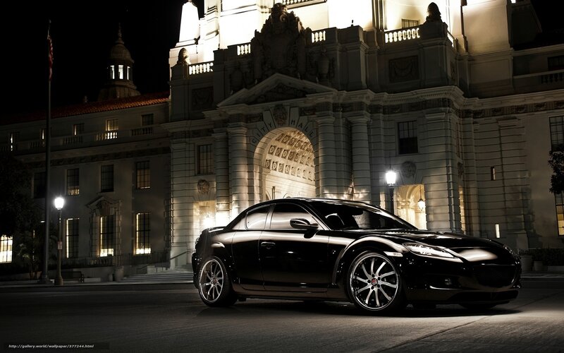 Black sports car at city hall