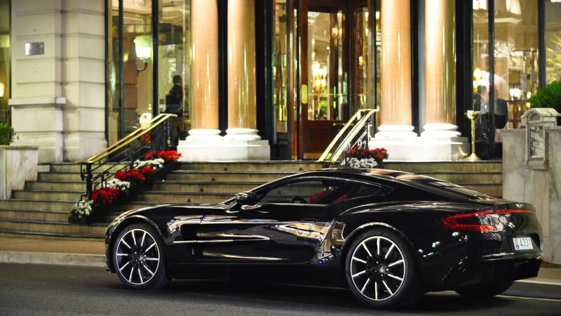 Black sports car at hotel entrance