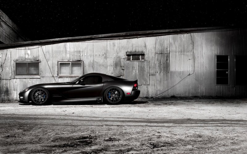 Black sports car at night