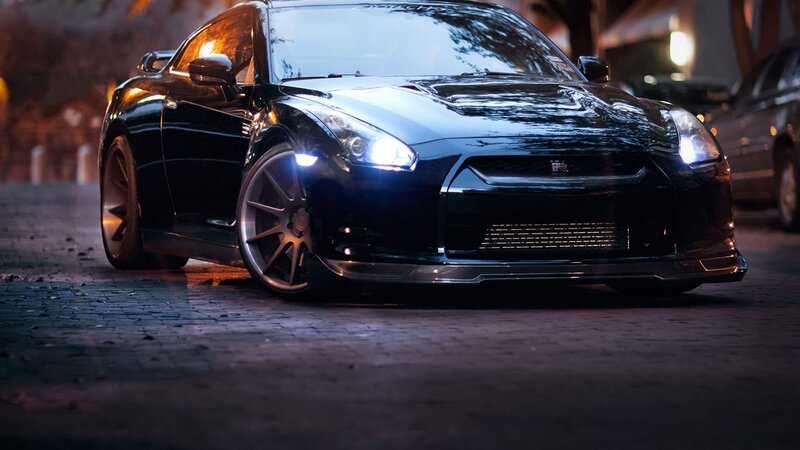 black sports car at night
