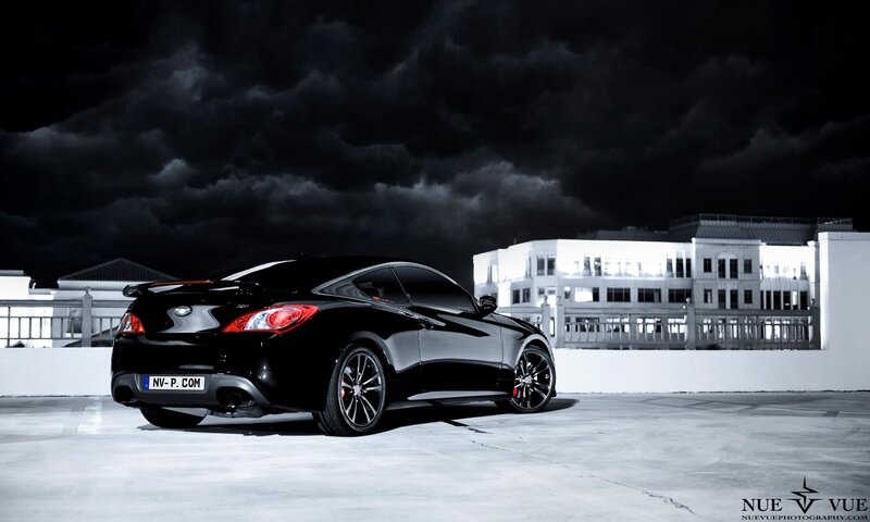 Black sports car at night