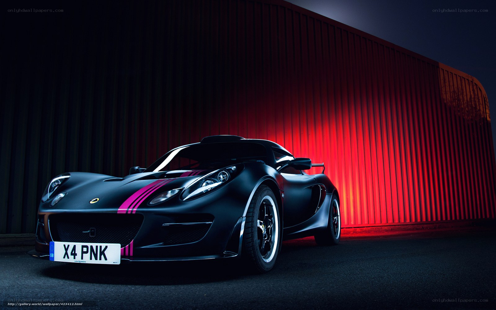 black sports car at night