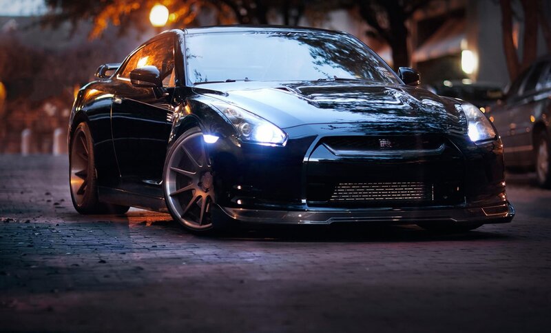 black sports car at night