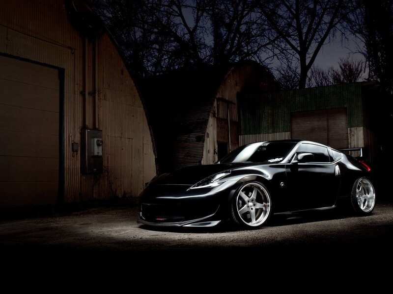 Black sports car at night