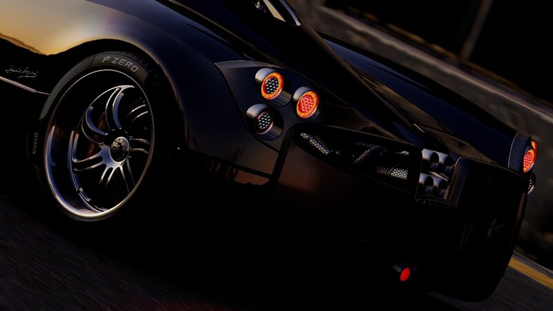 black sports car at night