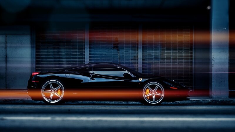 Black sports car at night