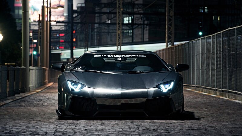 black sports car at night