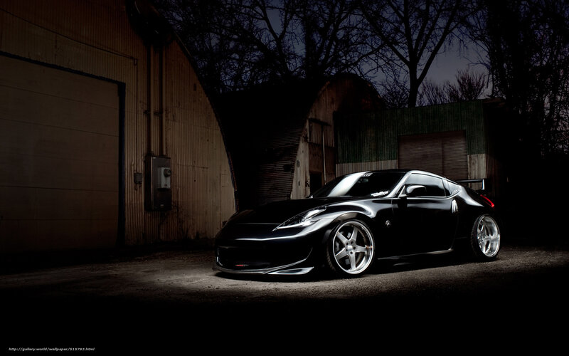Black sports car at night