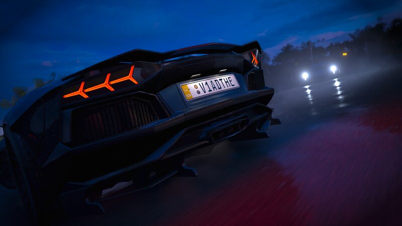 Black Sports Car at Night — Blue