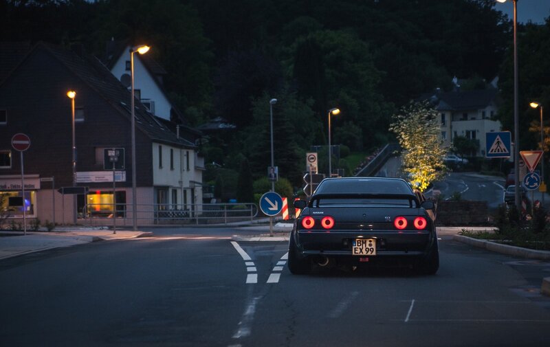 Black Sports Car at Night — Calm