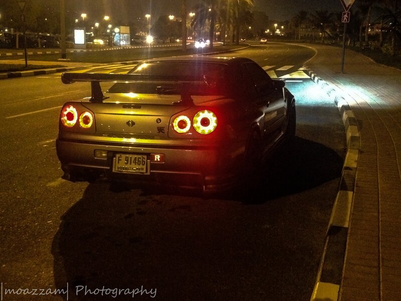 Black Sports Car at Night — Dark, Quiet