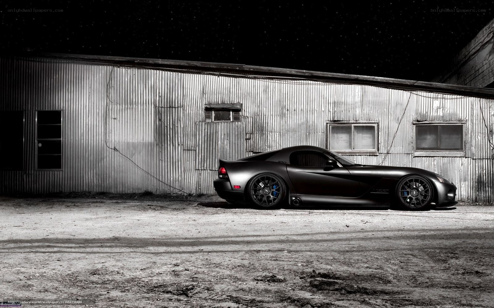 Black sports car at night
