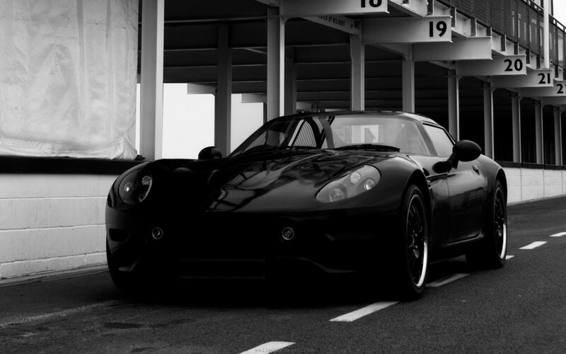 black sports car at racetrack