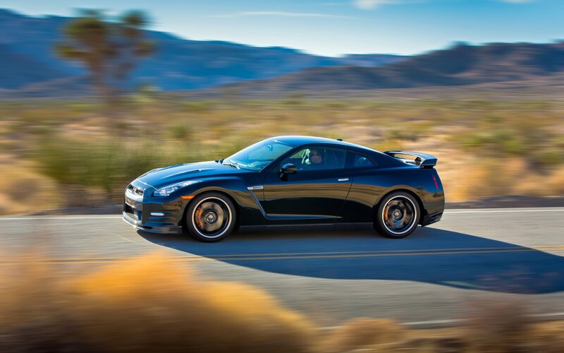 Black Sports Car — Blue, Dynamic, Afternoon, Photograph, Road, Mountains