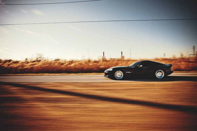 Black Sports Car — Brown, Dynamic, Sunset