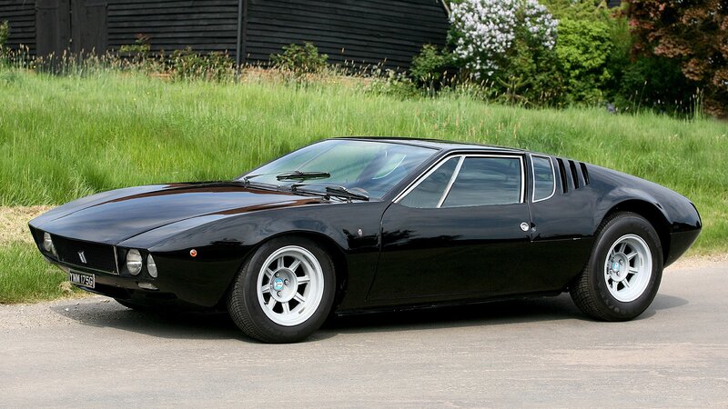 Black Sports Car — Calm, Afternoon, Photograph, Grass