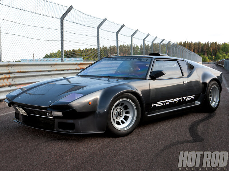 Black Sports Car — Calm, Afternoon, Photograph, Race Track