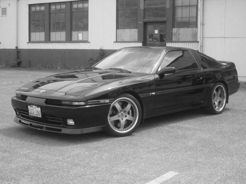 Black Sports Car — Calm, Photograph, Building, Windows
