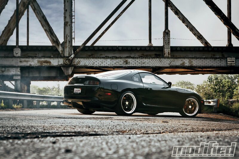 Black Sports Car — Dramatic, Afternoon, Photograph, Bridge, Road