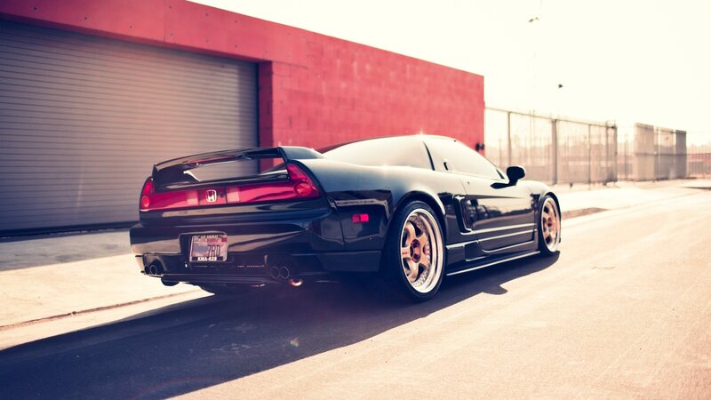 Black Sports Car — Dramatic, Afternoon, Photograph, Building, Fence, License Plate