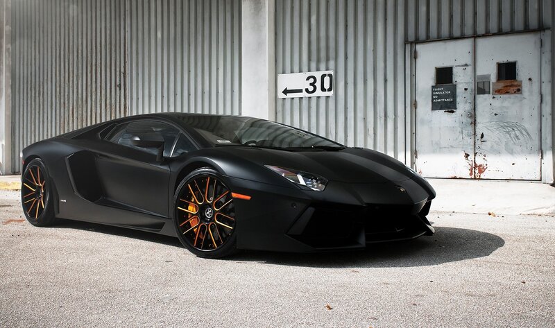 Black Sports Car — Dramatic, Afternoon, Photograph, Building, Sign