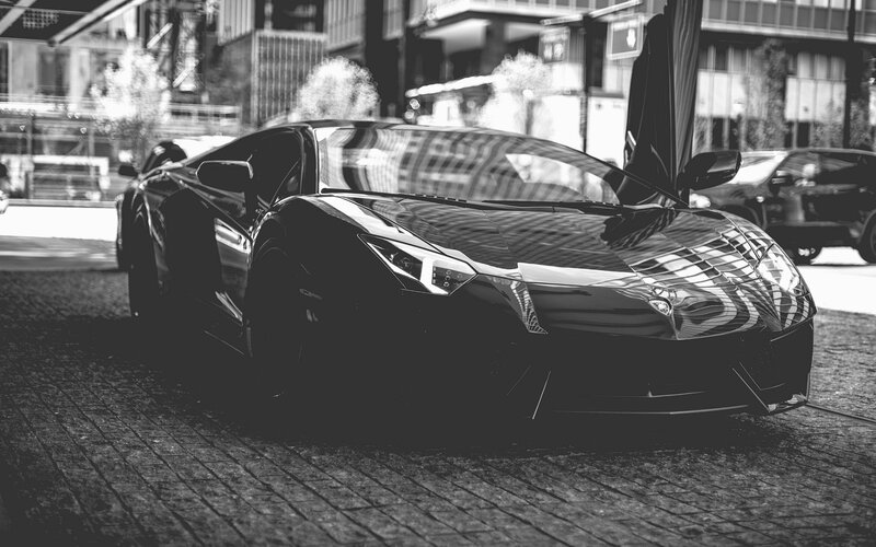 Black Sports Car — Dramatic, Afternoon, Photograph, Building, Street, White