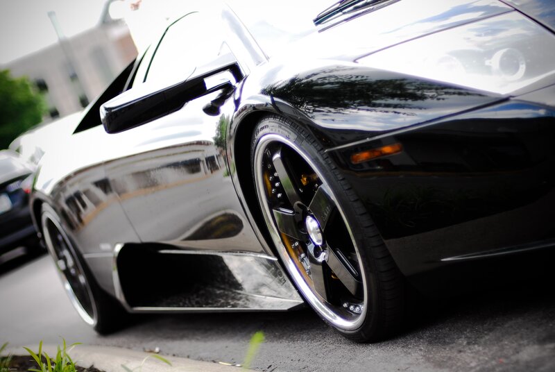Black Sports Car — Dramatic, Afternoon, Photograph, Car Wheel, Side Mirror