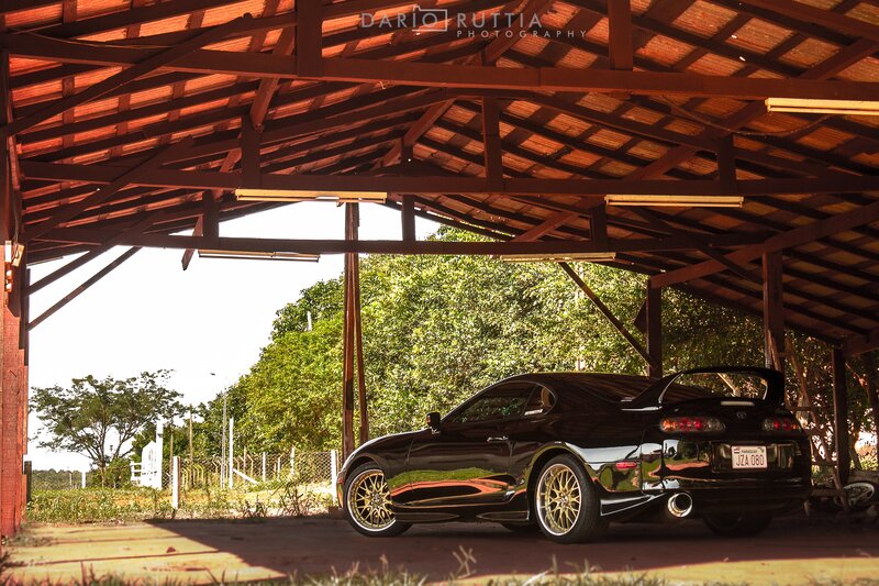 Black Sports Car — Dramatic, Afternoon, Photograph, Carport