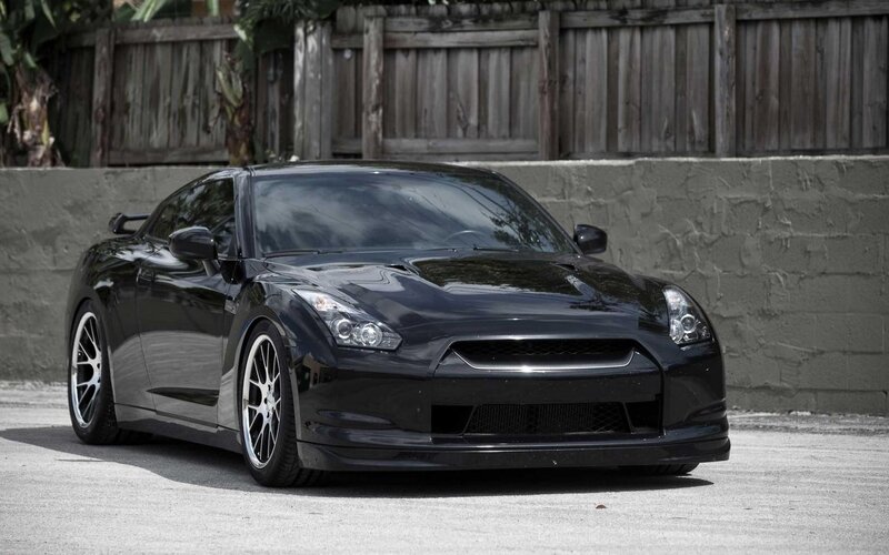 Black Sports Car — Dramatic, Afternoon, Photograph, Fence, Wall