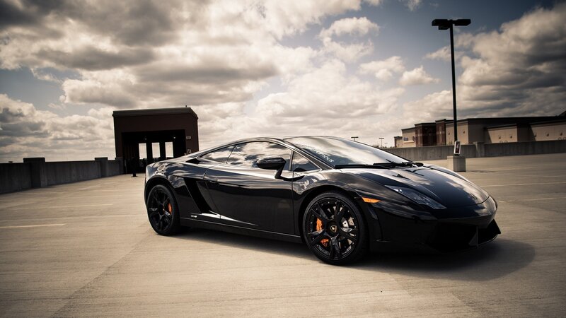 Black Sports Car — Dramatic, Afternoon, Photograph, Parking Lot, Clouds