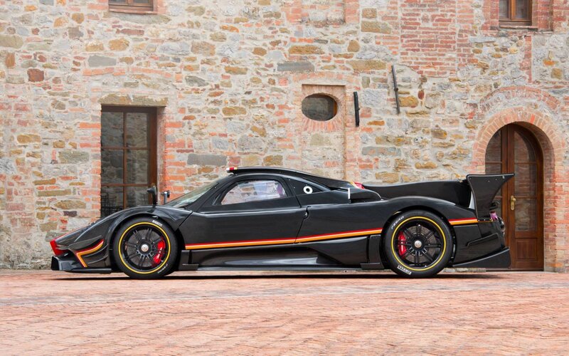Black Sports Car — Dramatic, Afternoon, Photograph, Stone Building, Brick Pavement