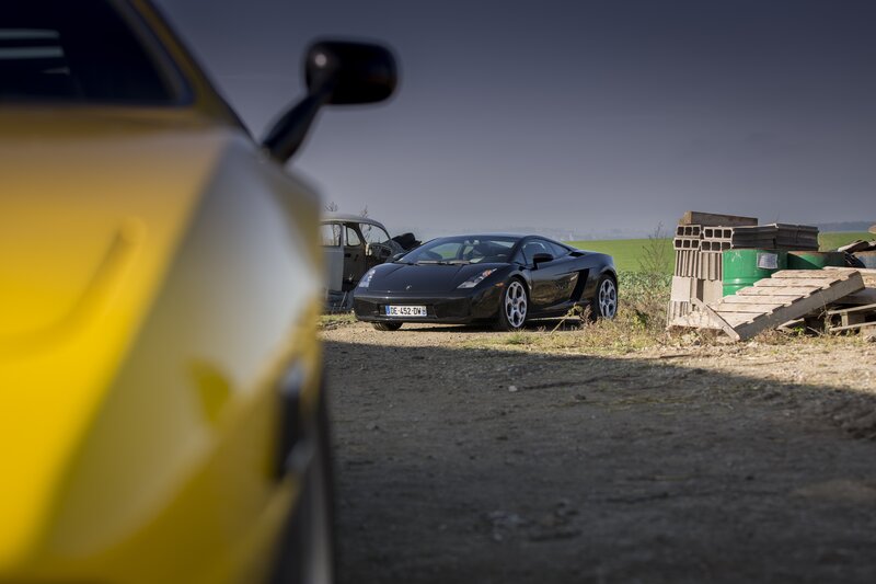 Black Sports Car — Dramatic, Afternoon, Photograph, Yellow Car