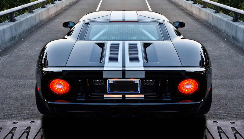 Black Sports Car — Dramatic, Night, Photograph, Bridge