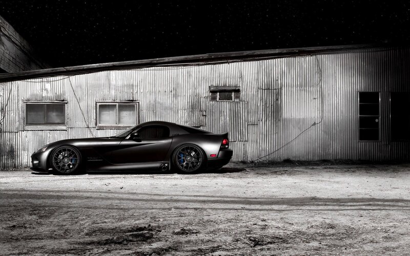 Black Sports Car — Dramatic, Night, Photograph, Building, Windows
