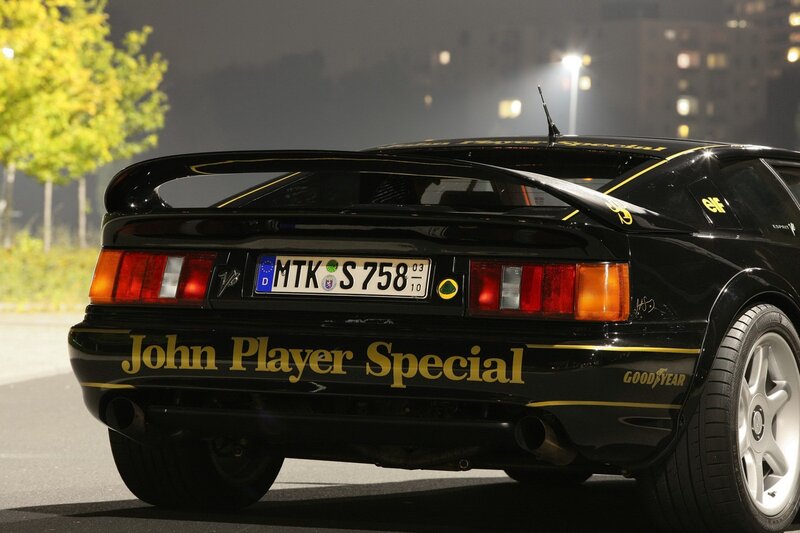 Black Sports Car — Dramatic, Night, Photograph, License Plate
