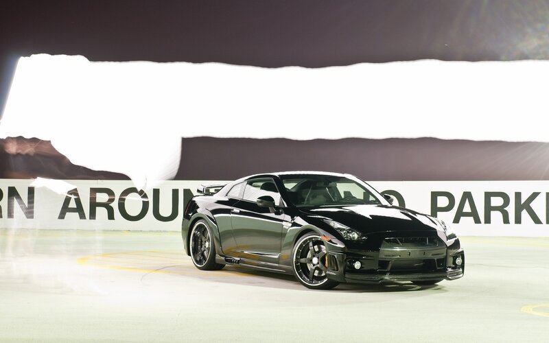 Black Sports Car — Dramatic, Night, Photograph, Parking Garage, Wall
