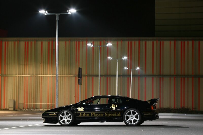 Black Sports Car — Dramatic, Night, Photograph, Streetlights