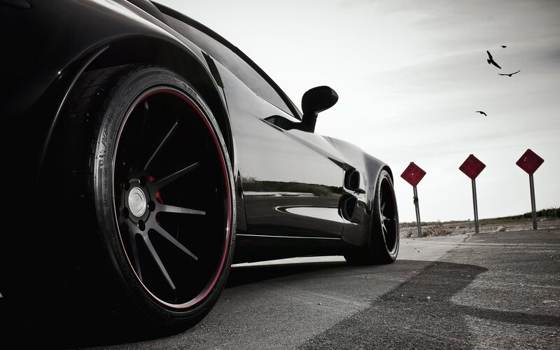 Black Sports Car — Dramatic, Photograph, Birds