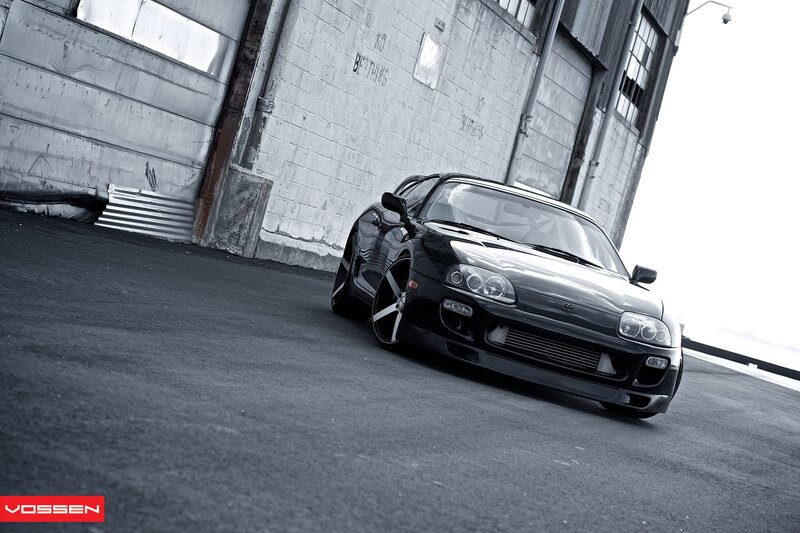 Black Sports Car — Dramatic, Photograph, Building, Asphalt